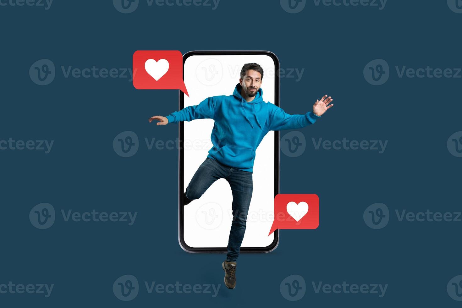 A man jumps out from a smartphone screen, surrounded by heart emojis, symbolizing excitement in digital communication and love. The vibrant collage emphasizes the connection in modern dating. photo