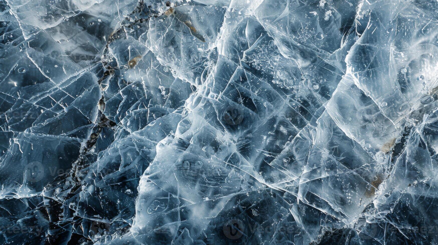 Close focus on the surface of ice reveals detailed, crystalline structures with distinct lines and textures, captured in bright natural light, depicting winter beauty. photo