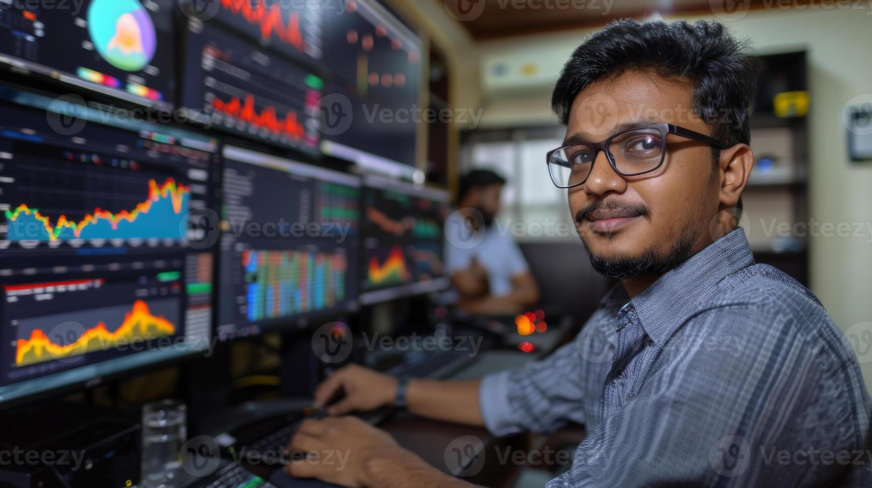 In a modern trading environment, two individuals focus on analyzing financial charts and data on large screens, immersed in the world of stock market trading and analysis. photo
