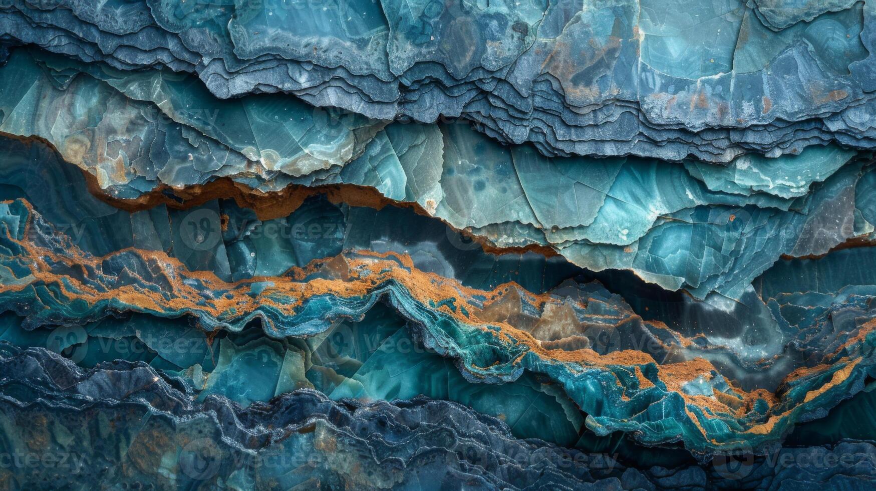 Textured layers of blue and teal rocks show natural formations, highlighted by striking orange lines that add contrast to the geological masterpiece, emphasizing the intricate design of nature. photo