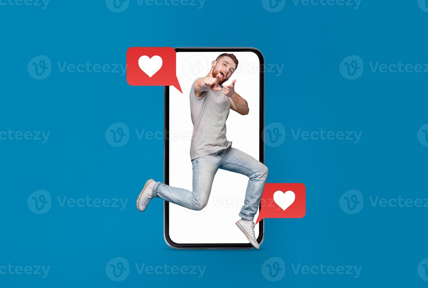 A young person joyfully jumps in front of a smartphone, surrounded by heart icons and text bubbles. This vibrant display captures the excitement of digital connections and modern dating. photo