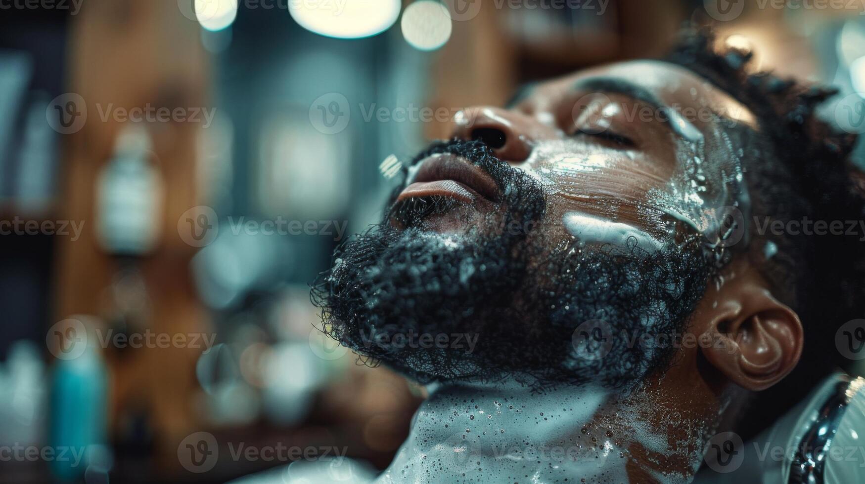 A man relaxes in a barber chair as he enjoys a soothing beard grooming session, with rich lather and focused attention from the barber in a stylish environment. photo