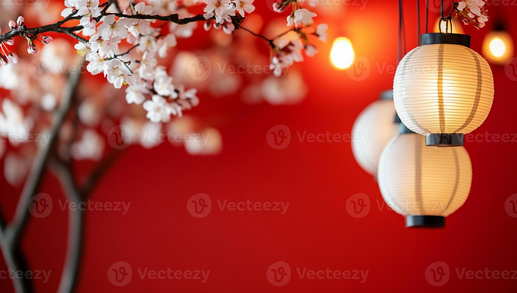 A decorative scene featuring lanterns and cherry blossoms on a red background. photo