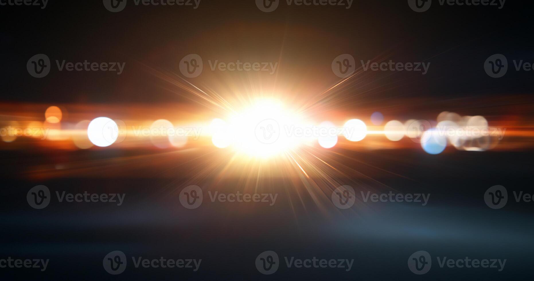 A bright light source creating a lens flare effect against a dark backdrop. photo