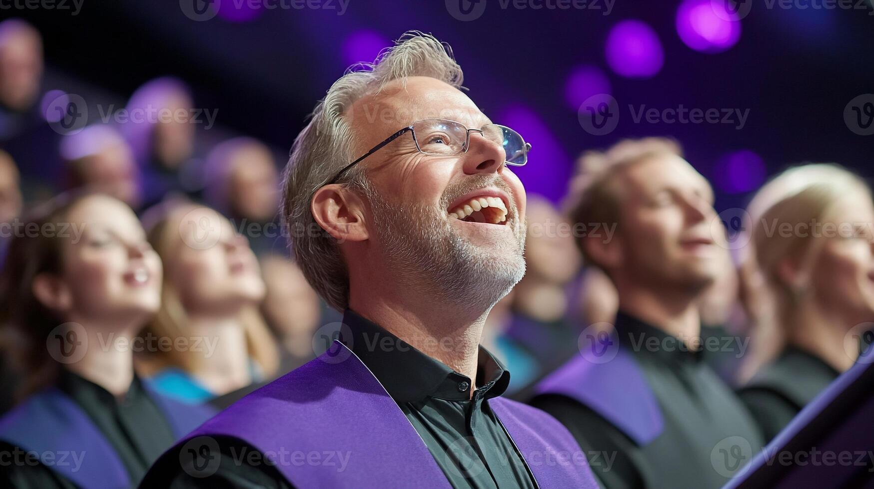 A smiling choir member performing in a vibrant concert setting. photo