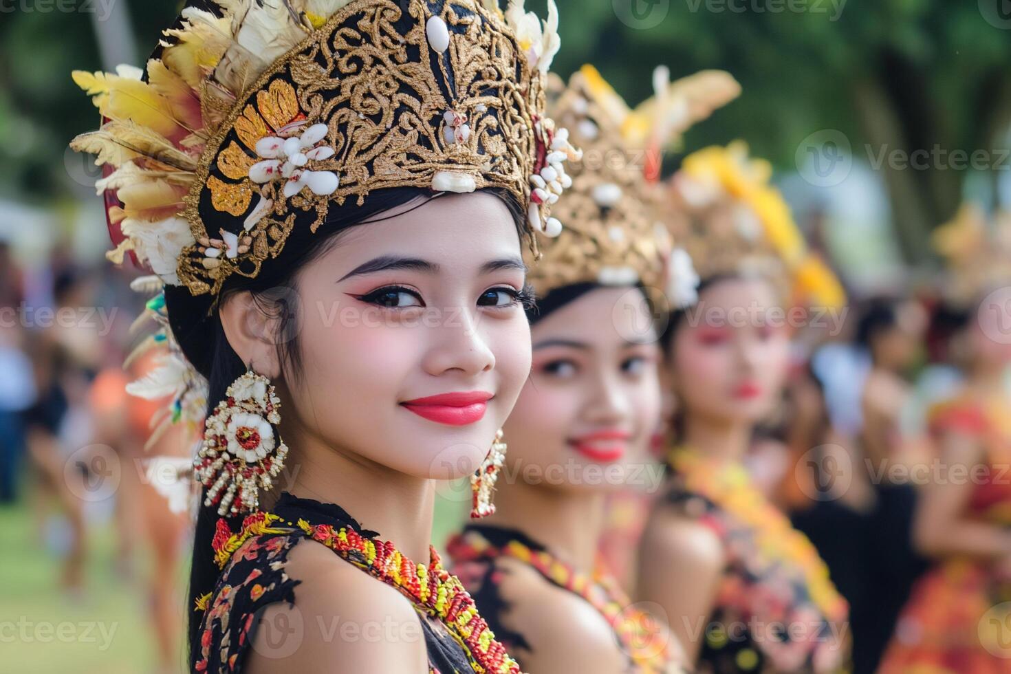 Young women in traditional attire showcase cultural celebration. photo