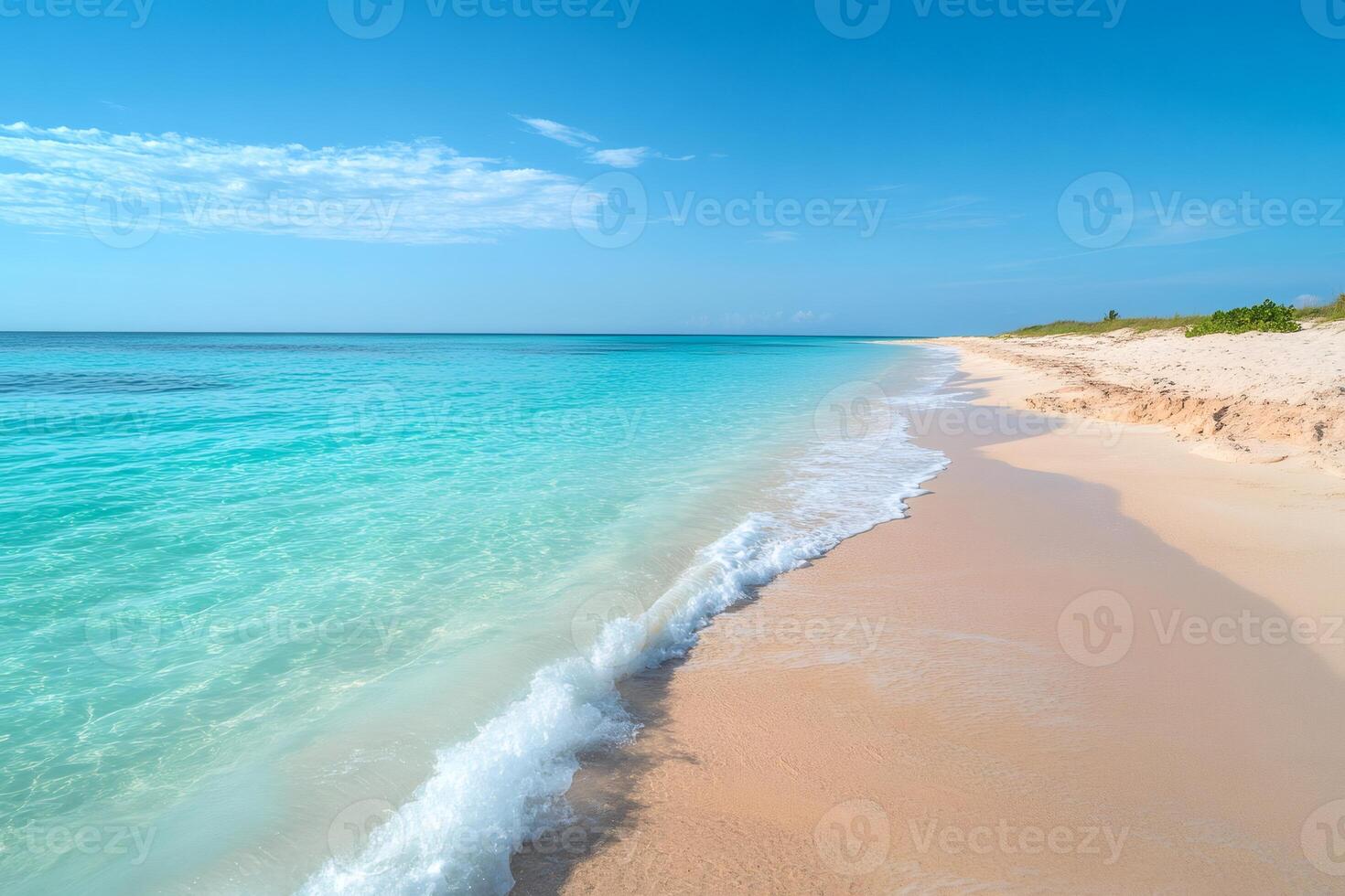 Turquoise water gently lapping on a pristine sandy beach in Cayo Largo, Cuba photo