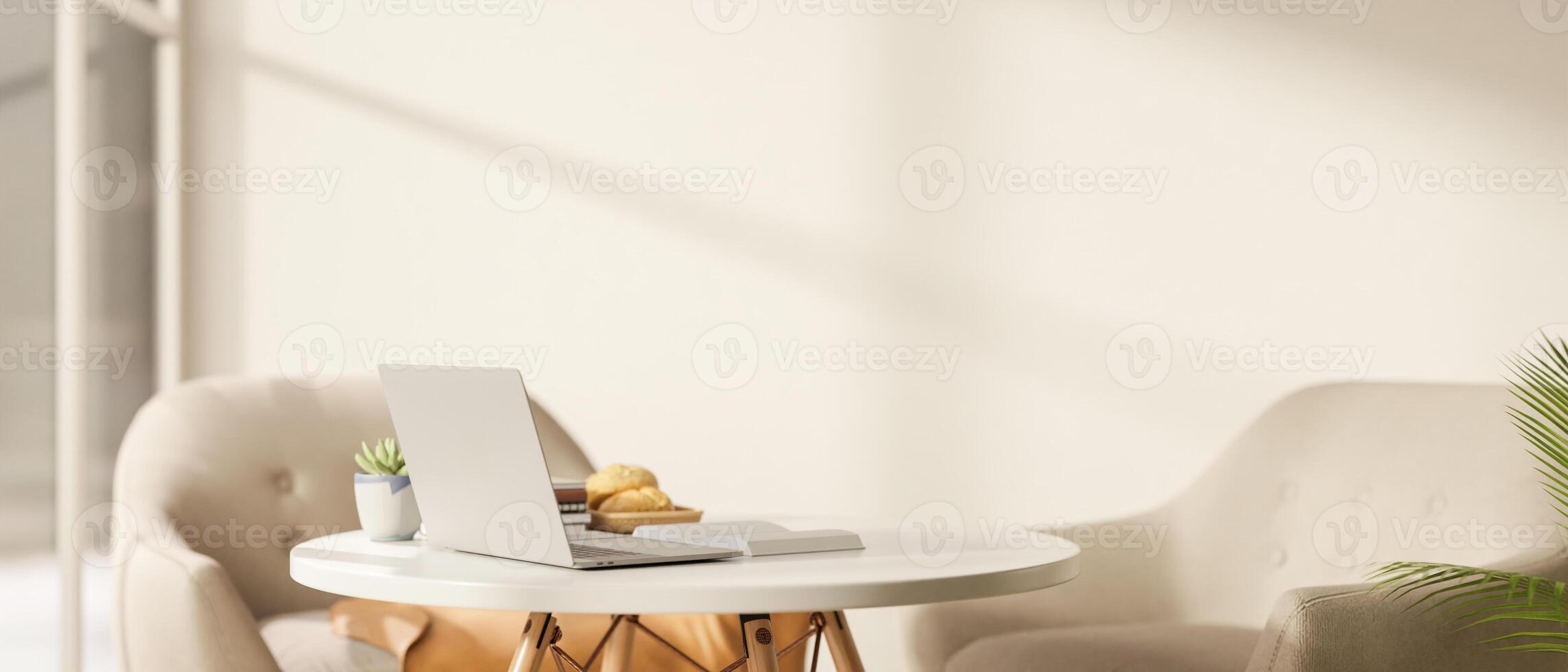 A White laptop on the wooden table with decorative item in the cosy cafe, workspace with sunlight. photo