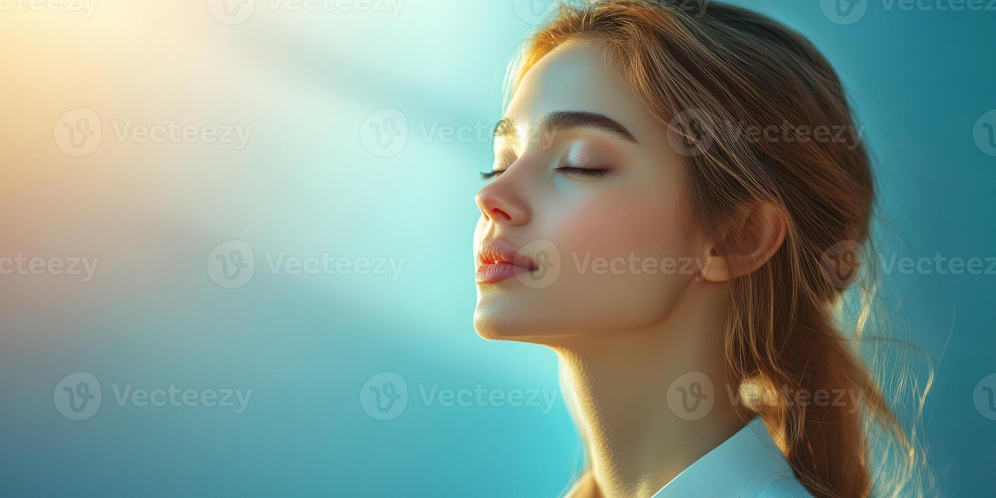 Moment of tranquility as a young woman enjoys serene sunlight with closed eyes in a peaceful setting photo
