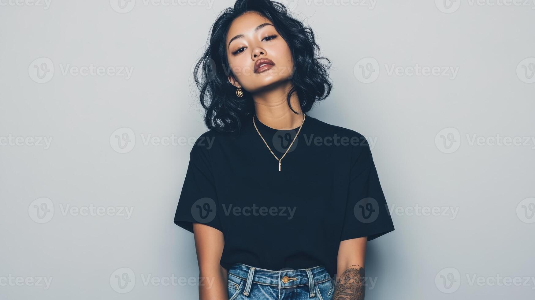Young Woman Wearing Black Shirt and Jeans photo