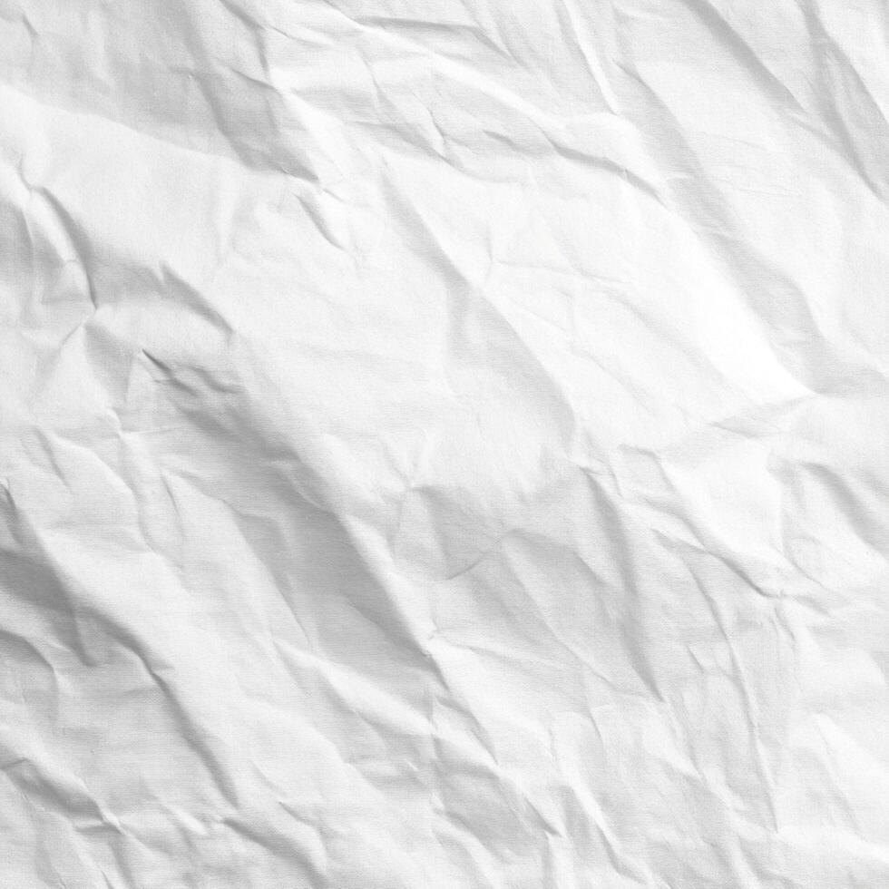 Close-up of crumpled white paper texture photo