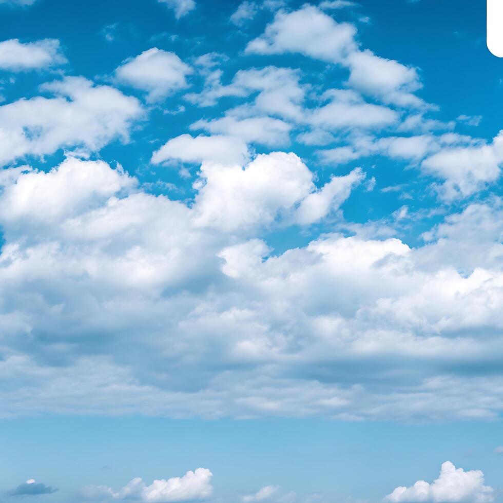 bright blue sky filled with fluffy white clouds photo