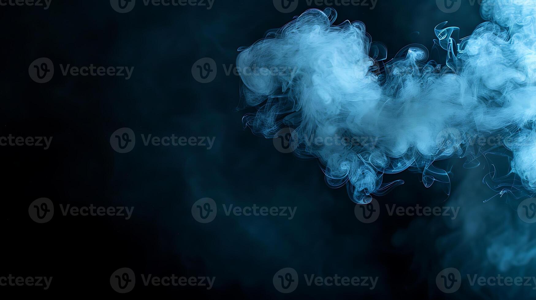 Blue vapor swirls on black background, abstract art for design photo