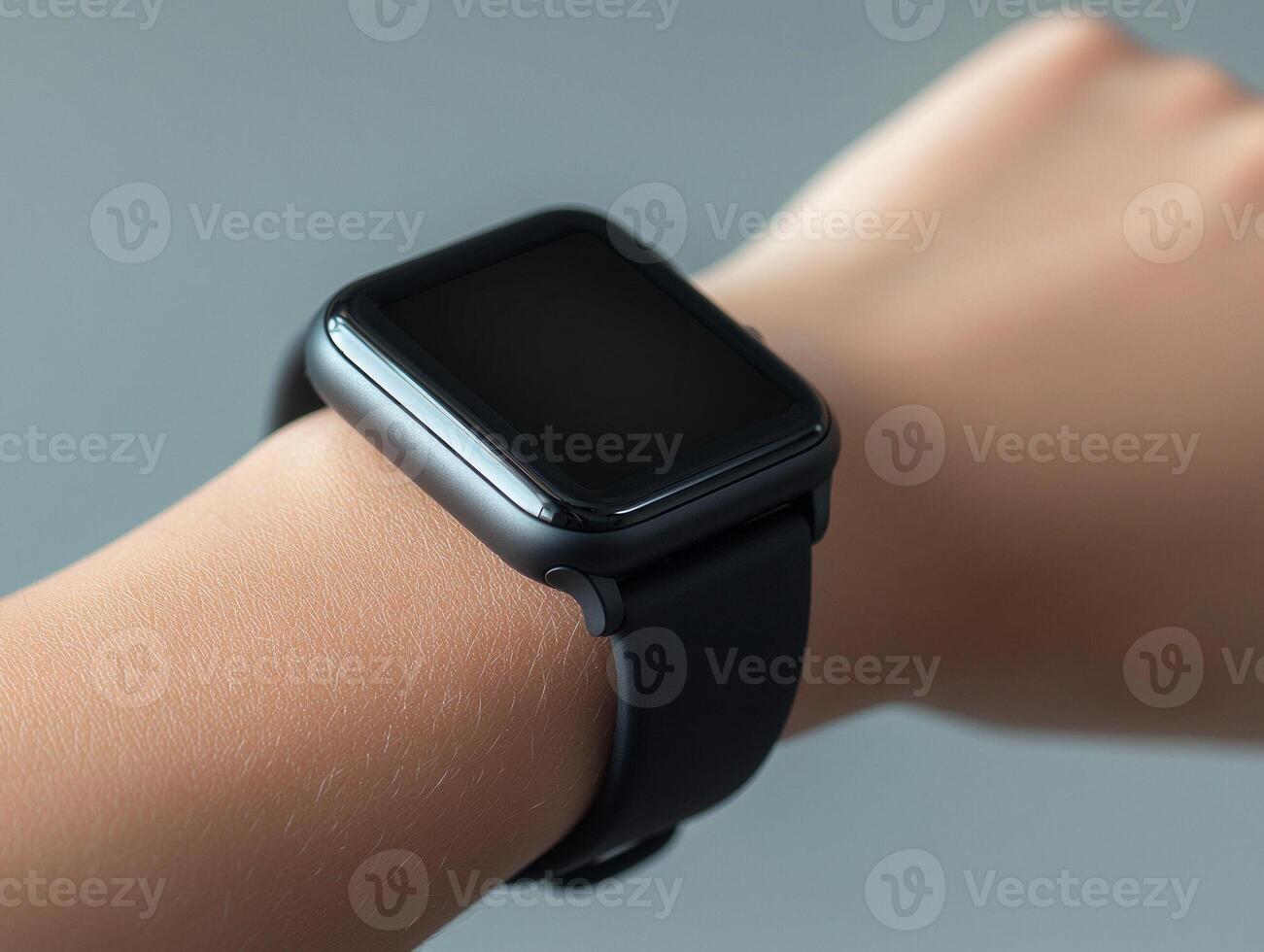 Close up shot showcases smartwatch mockup customizable display resting on wrist against clean grey background emphasizing modern design and functionality photo