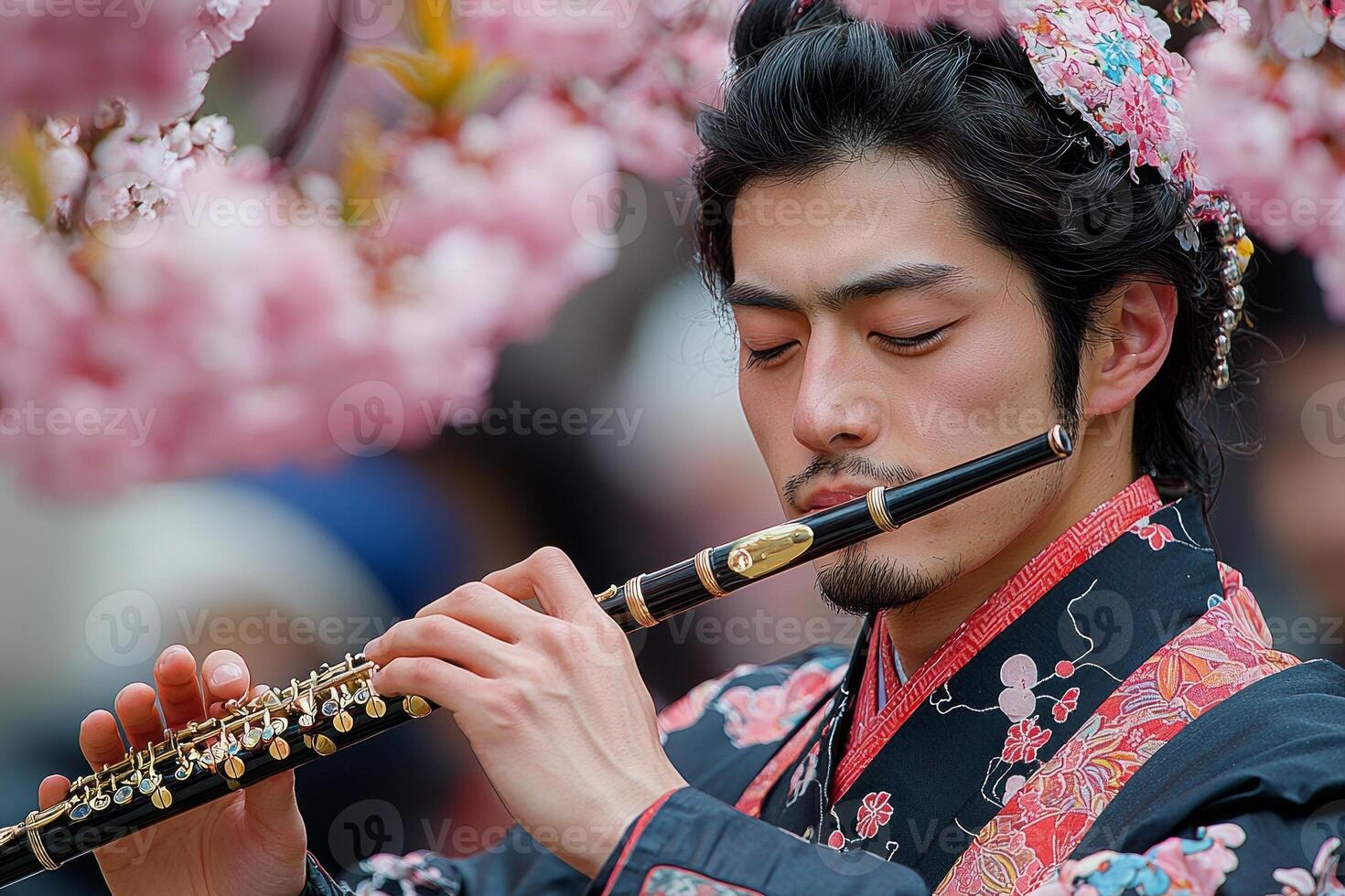skilled musician plays flute vibrant canopy of pink blossoms. Their traditional costume harmonizes beautifully springtime ambiance photo