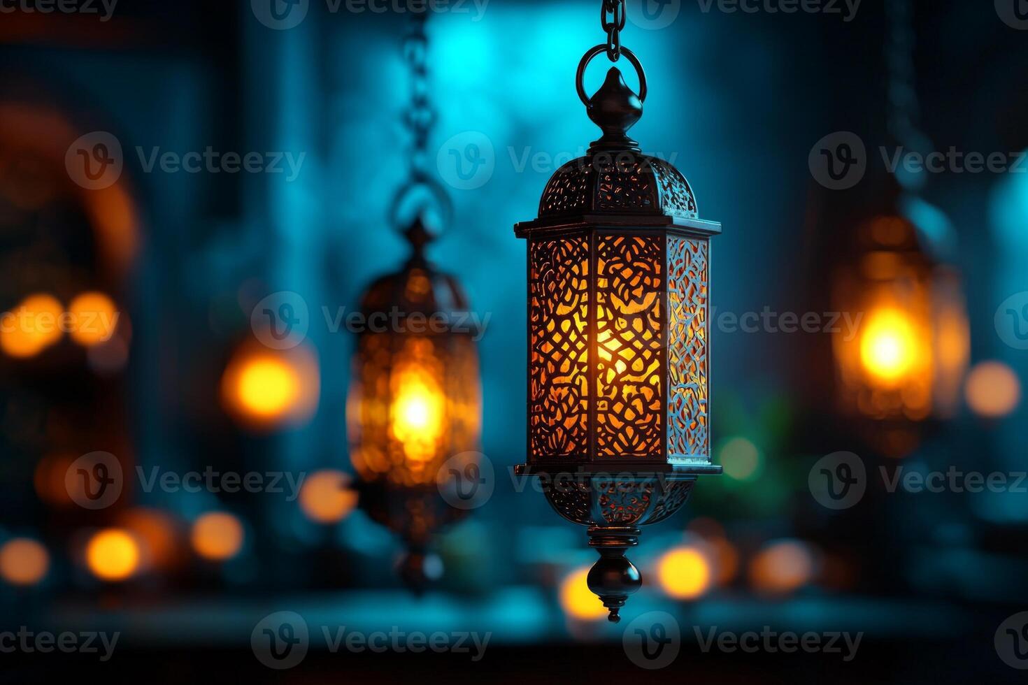 Hanging Moroccan lanterns illuminate surroundings warm light casting intricate patterns on walls against serene deep blue evening backdrop evoking festive atmosphere photo