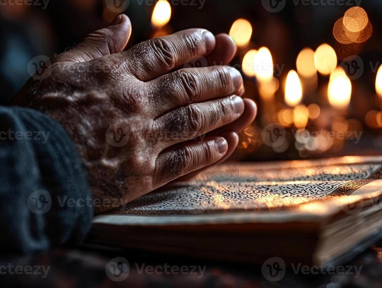 Hands are raised in prayer while illuminated candlelight accompanied open Quran displaying beautiful Arabic calligraphy symbolizing unity and faith during Eid festivities photo
