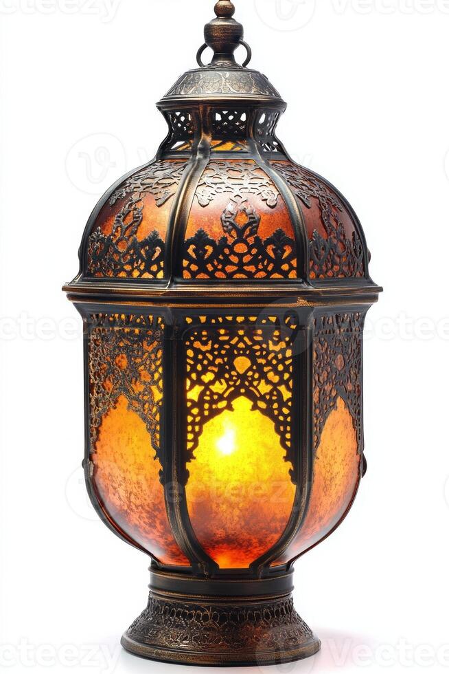 An ornate metal lantern with intricate patterns, casting a warm, amber glow, creating a cozy and inviting atmosphere. photo