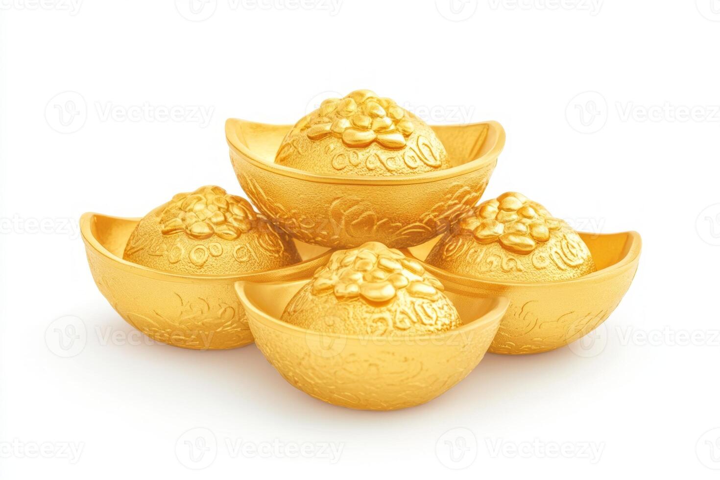 Stack of ornate golden ingots symbolizing wealth and prosperity. photo
