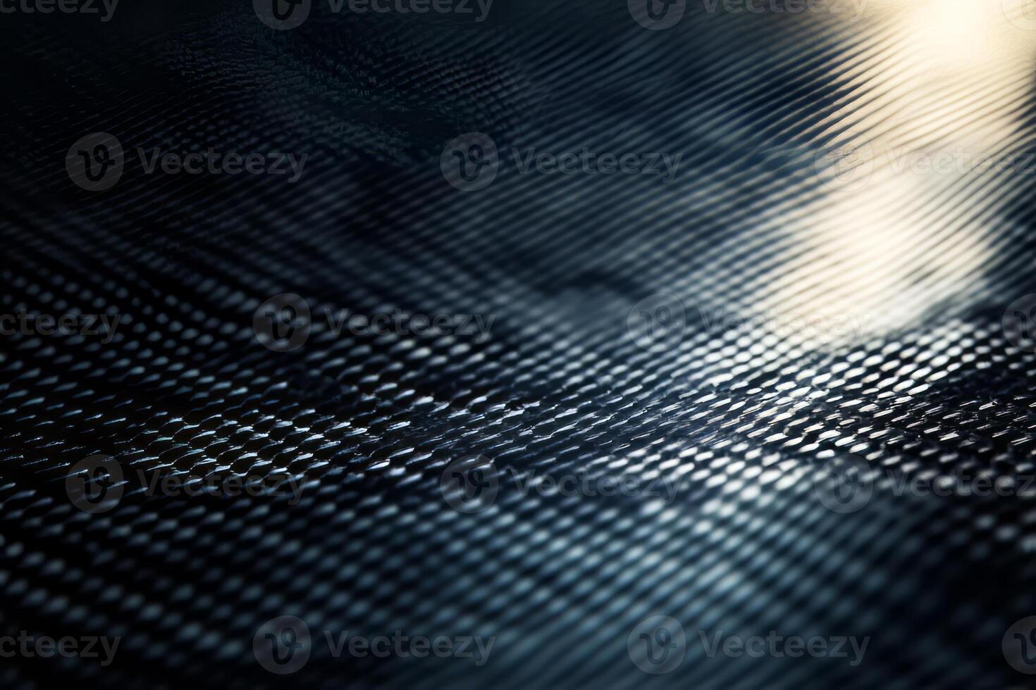 Abstract texture of a dark, reflective surface with intricate patterns. photo