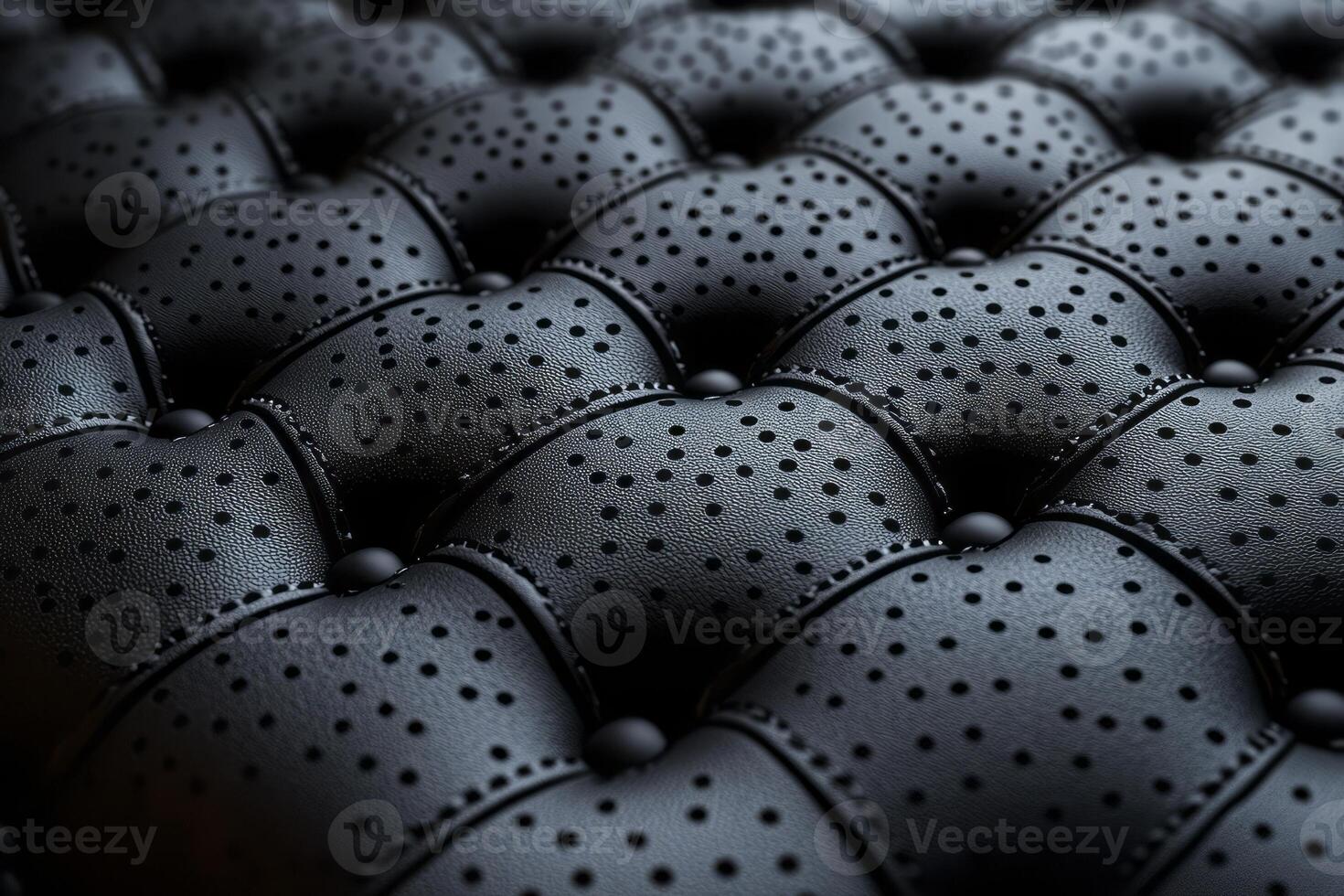 Close-up of a luxurious black leather texture with perforations, highlighting intricate craftsmanship and modern design. photo