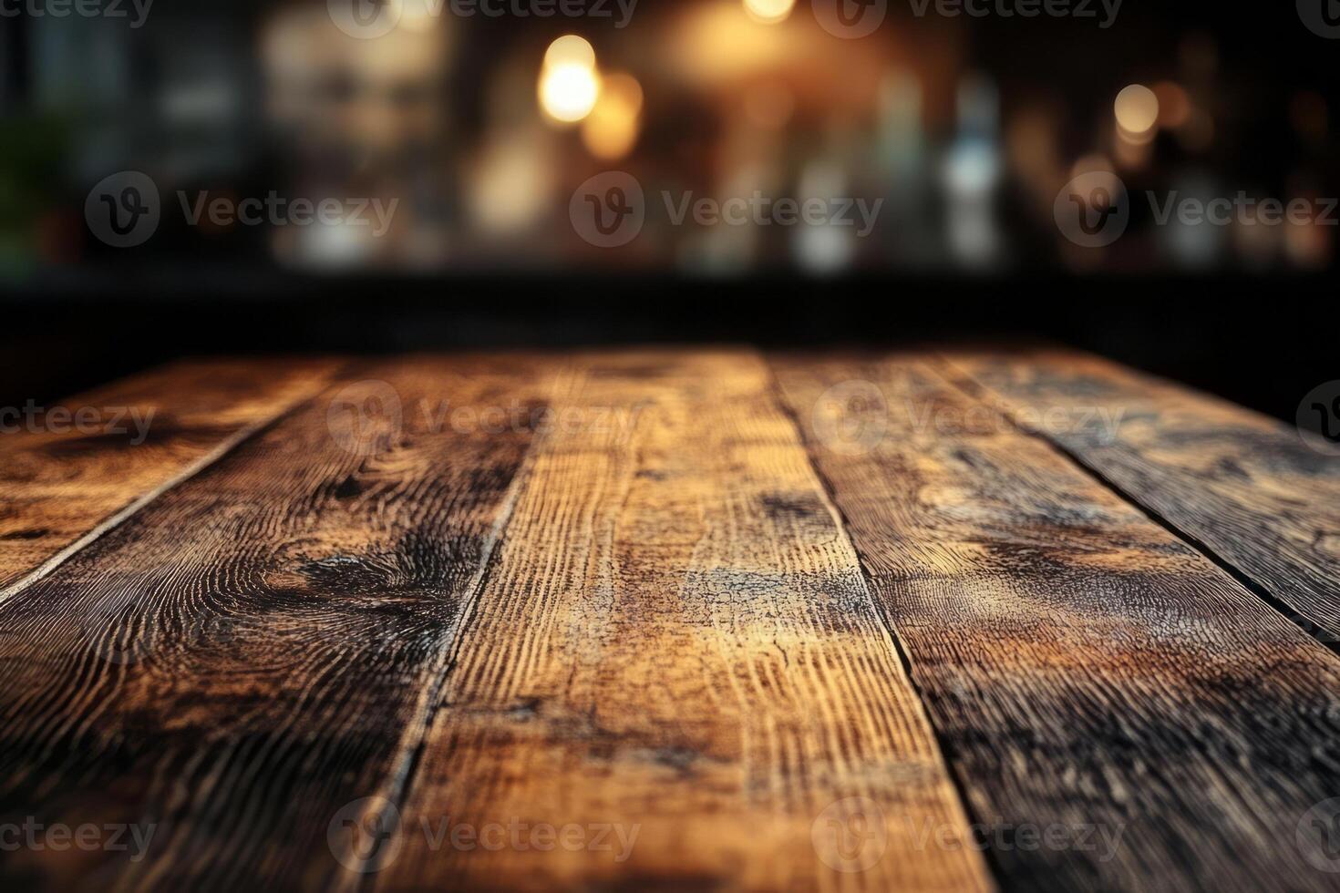 A close-up view of a rustic wooden table, showcasing intricate grain patterns and warm tones amidst a softly lit background. photo
