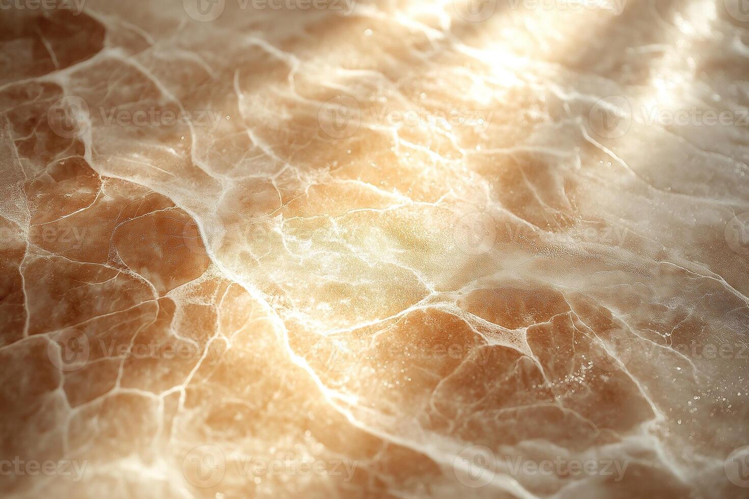Close-up of a warm-toned, translucent marble texture with delicate light reflections. photo