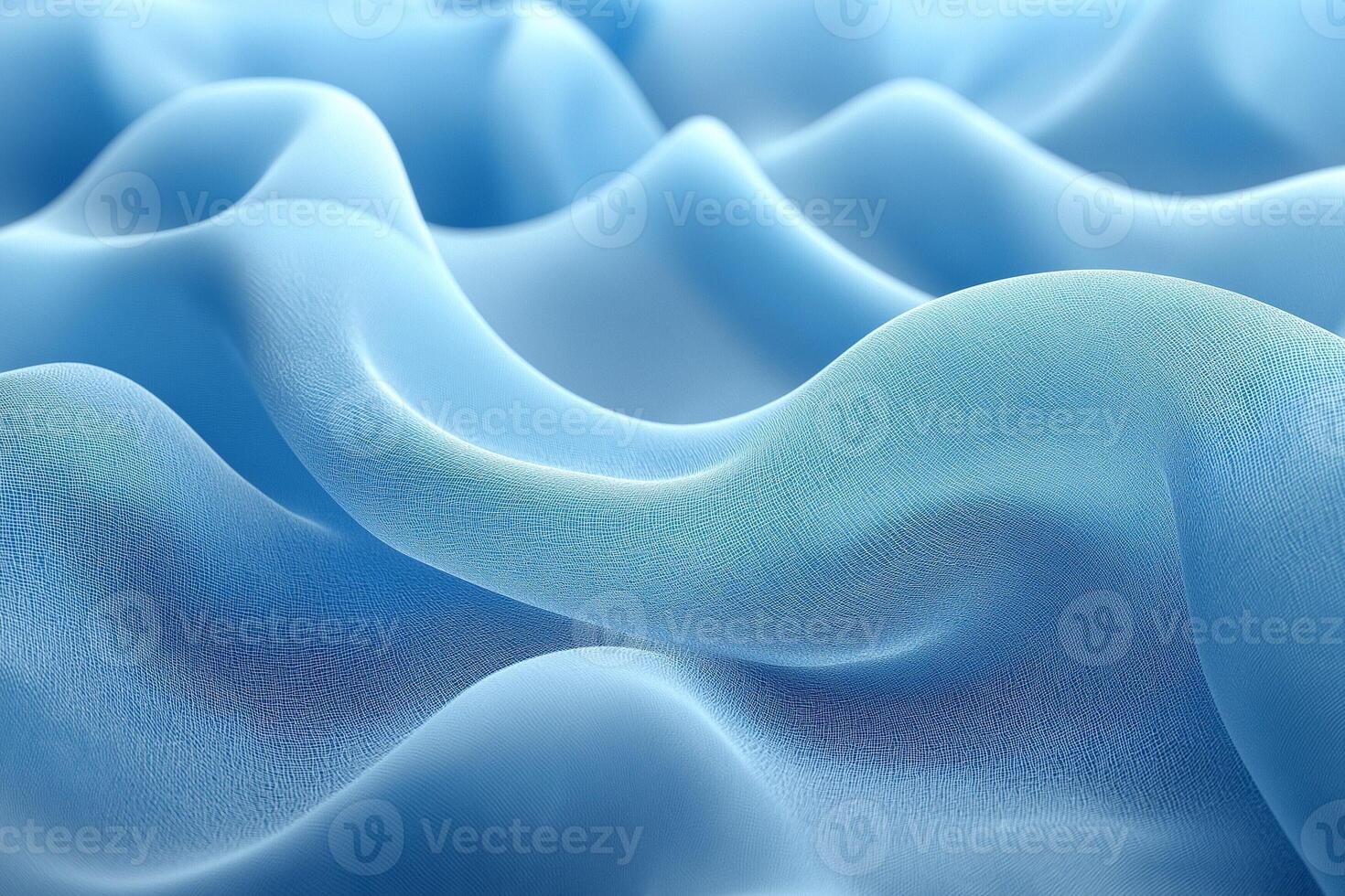 Soft waves of light blue fabric create a serene and calming visual texture. photo