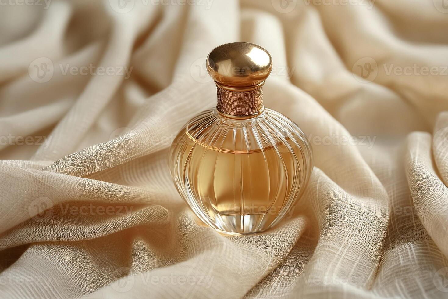 An elegant perfume bottle resting on soft, crumpled fabric, exuding luxury and allure. photo