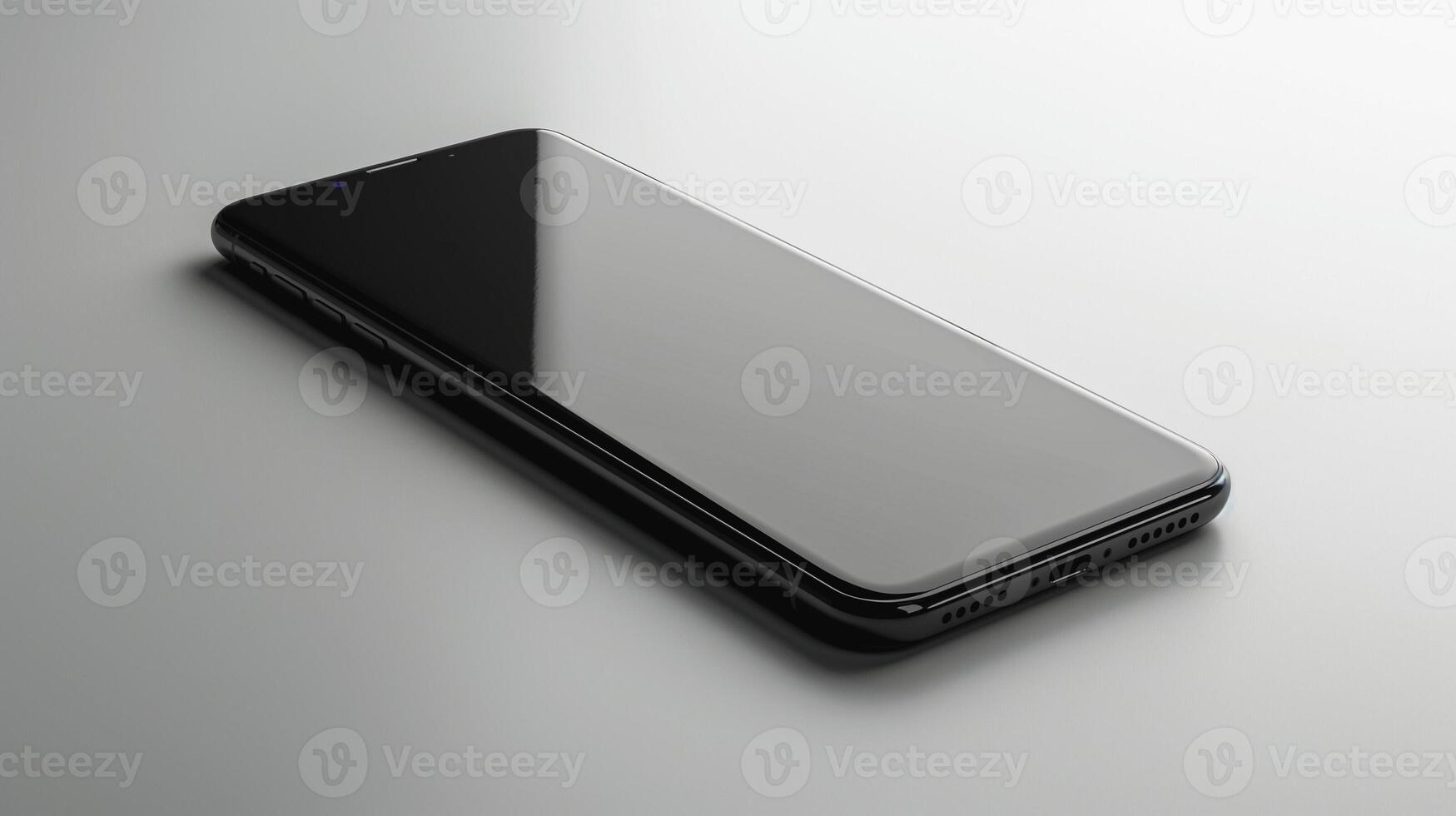 A sleek black smartphone lies elegantly on a smooth surface, showcasing its modern design and glossy screen. photo