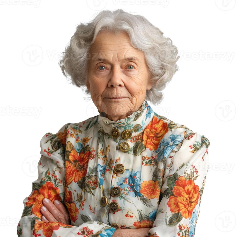 An elegant elderly woman with silver hair wearing a floral-patterned blouse, exuding wisdom and grace with a thoughtful expression. photo