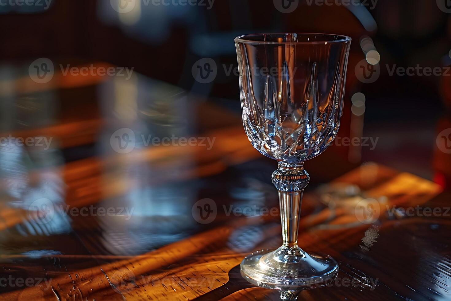A glass of wine on a table photo