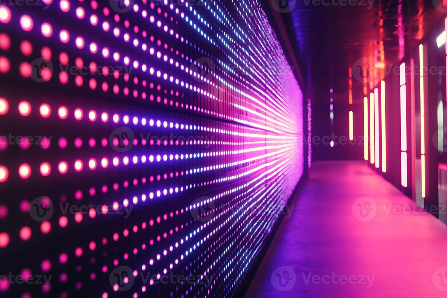 A hallway with colorful lights and neon signs photo