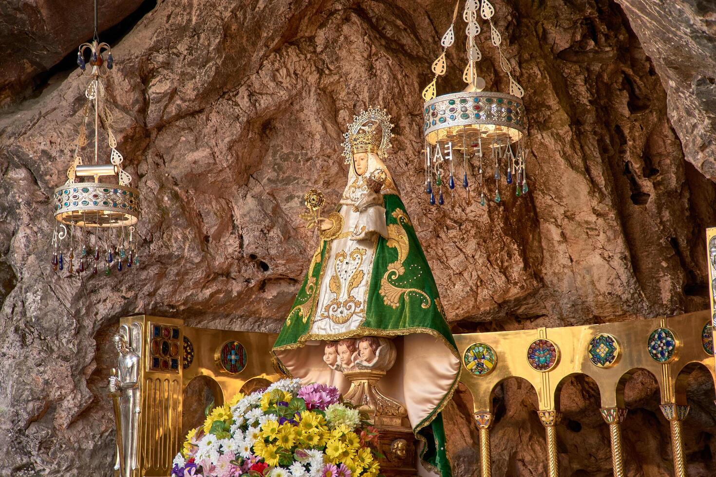 Religious sanctuary of Santa Cueva with the statue of the Virgin of Covadonga photo