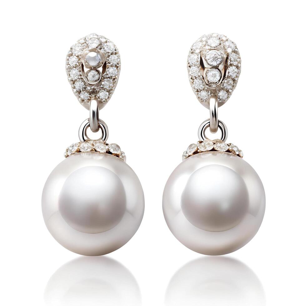 Beautiful Pearl Earrings dangling on white background photo