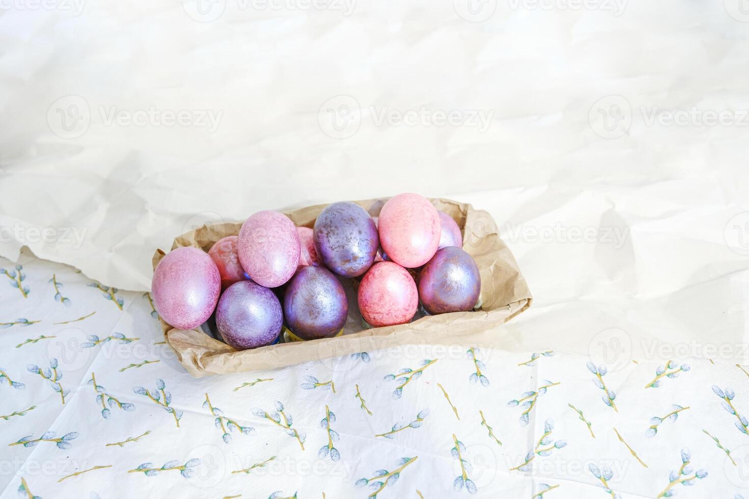 minimal Close-up view of chicken eggs, homemade easter cake and willow twigs photo
