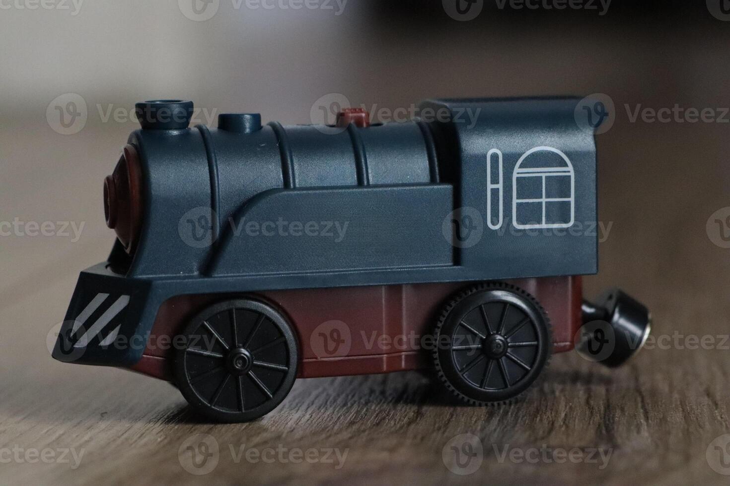 Vintage Toy Train A classic wooden engine that embodies a nostalgic childhood experience photo