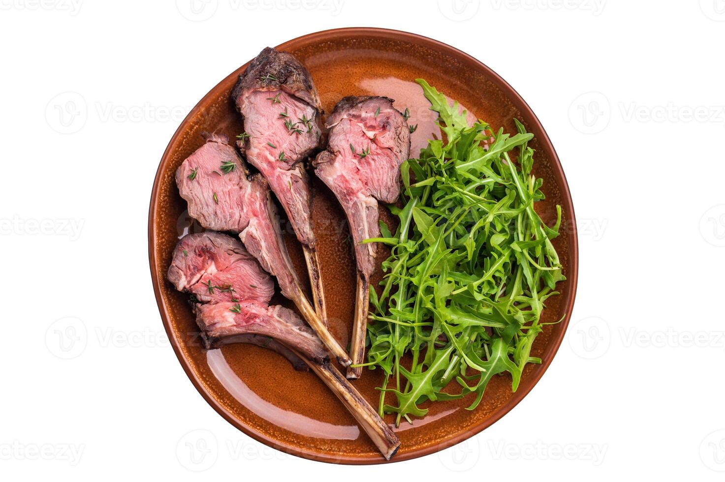Roasted lamb chop cutlets, mutton meat steaks with salad isolated on white backgrounds photo