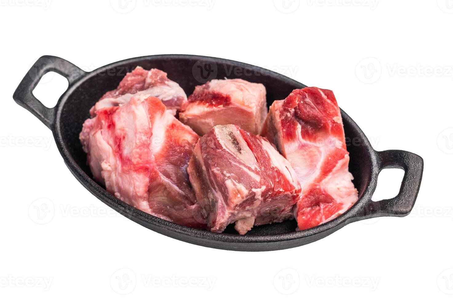 Raw chopped lamb meat with bones, uncooked mutton isolated on white background. top view photo