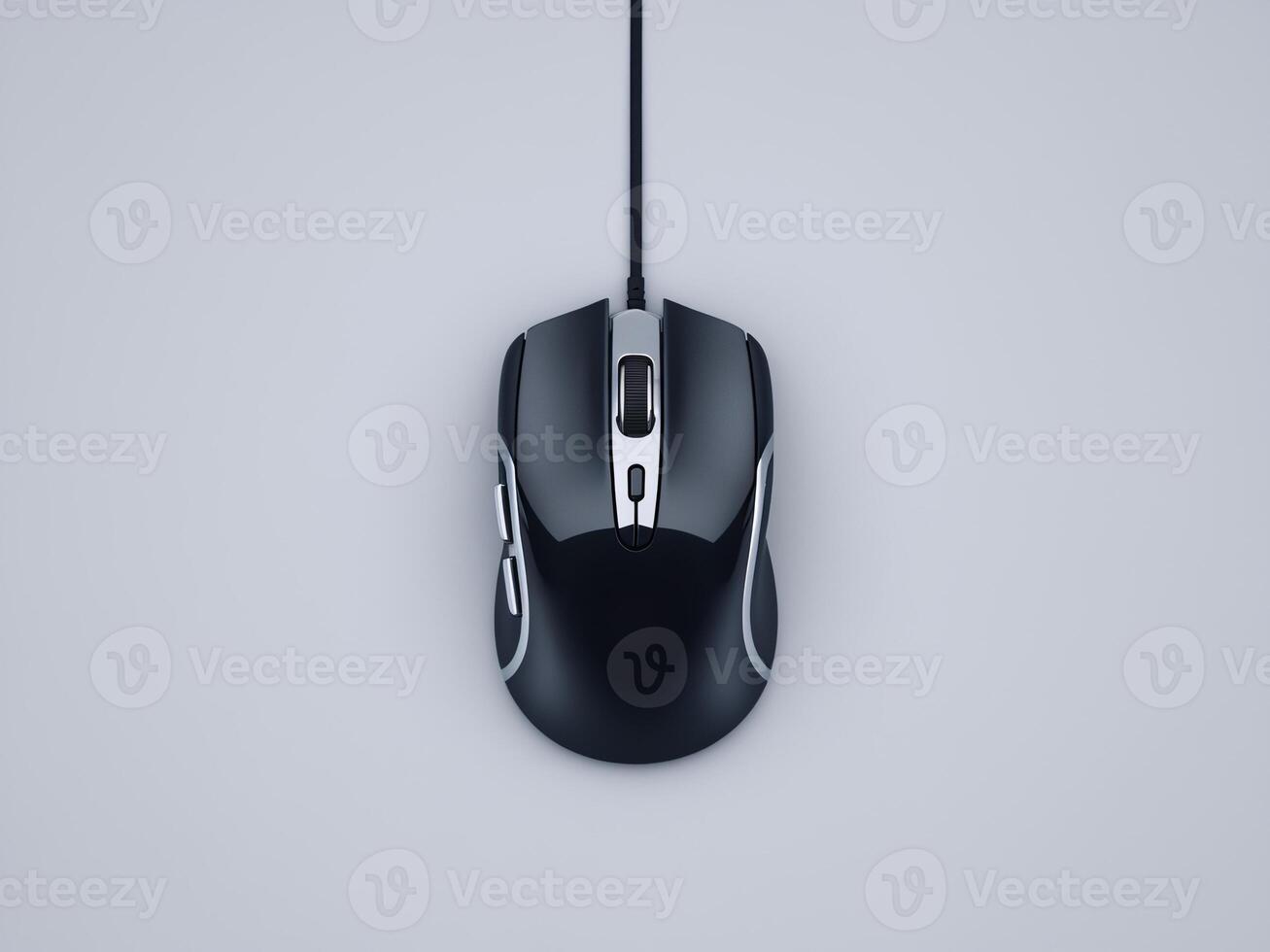 A sleek black gaming mouse with silver accents and a cable on a light gray background. photo