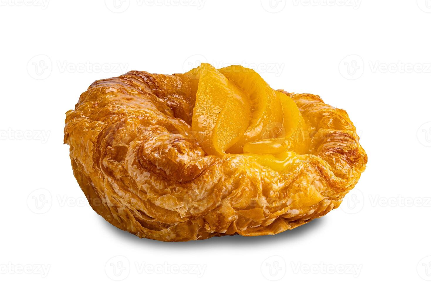 Side view of peach danish pastry isolated on white background. photo