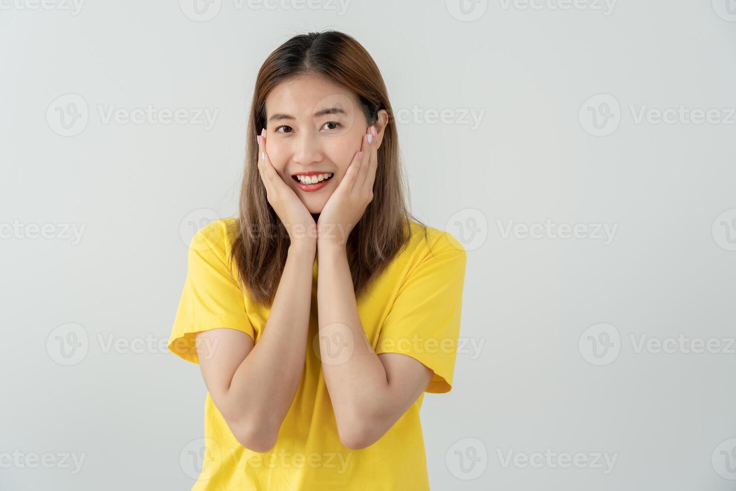 Asian beautiful woman exited surprise face expression . female feels shocked with the phone. exciting smile and happy adorable rejoices. Very enjoy and fun relax time. wow, girl holding smartphone photo
