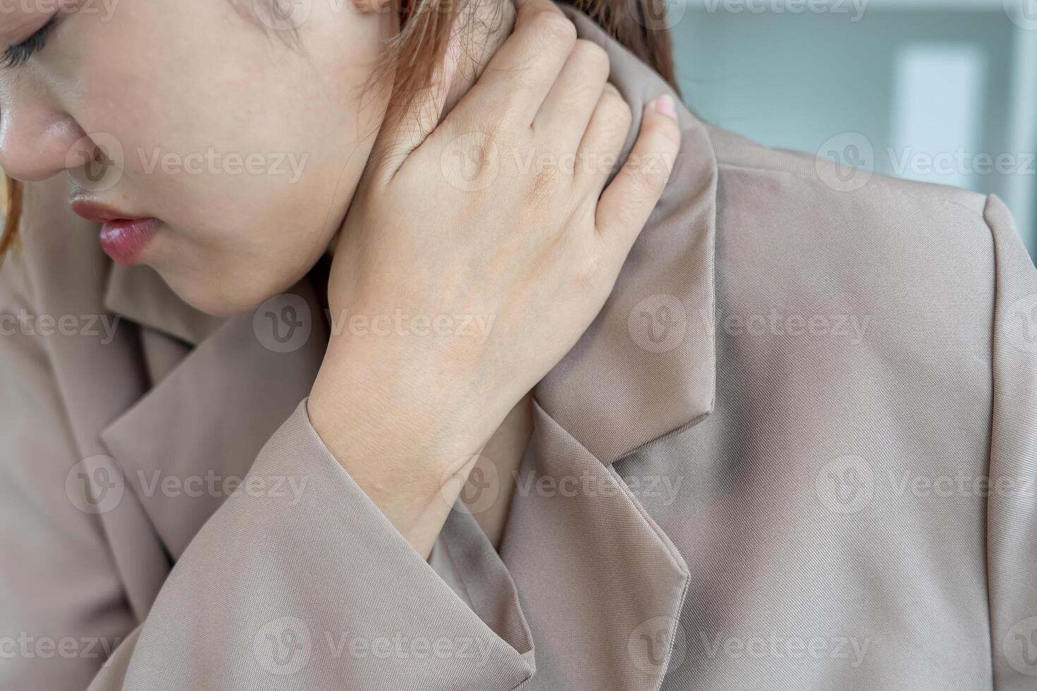 woman working in office with a carpal tunnel syndrome or wrist joint inflammation, hand muscle inflammation from office syndrome , hand muscle pain from working. photo