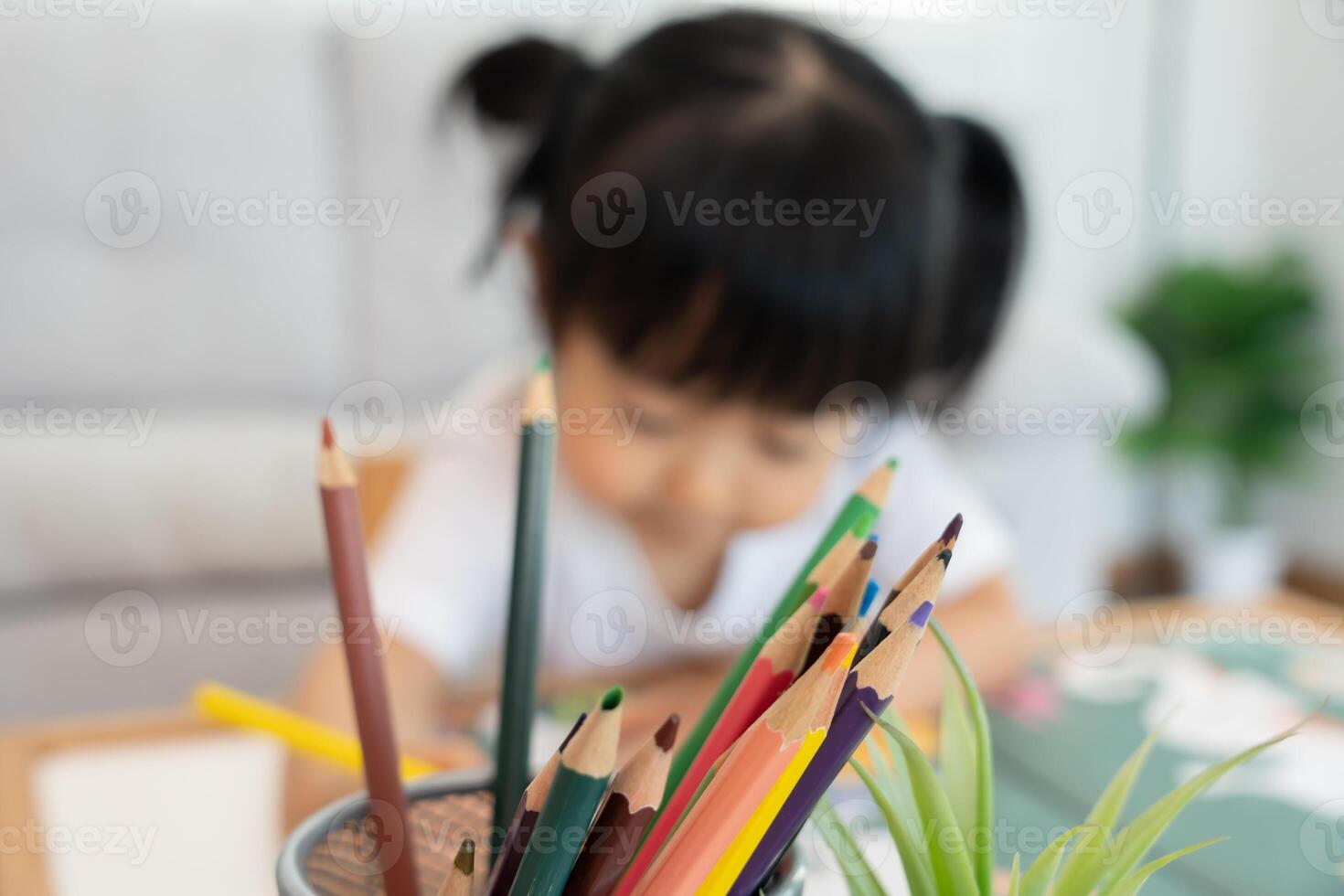 Happy Asia children learning and enjoy paint. family is happy and excited in the house. Mother and daughter having fun spending time together. Holiday, Activity, Executive Function, IQ, EQ photo
