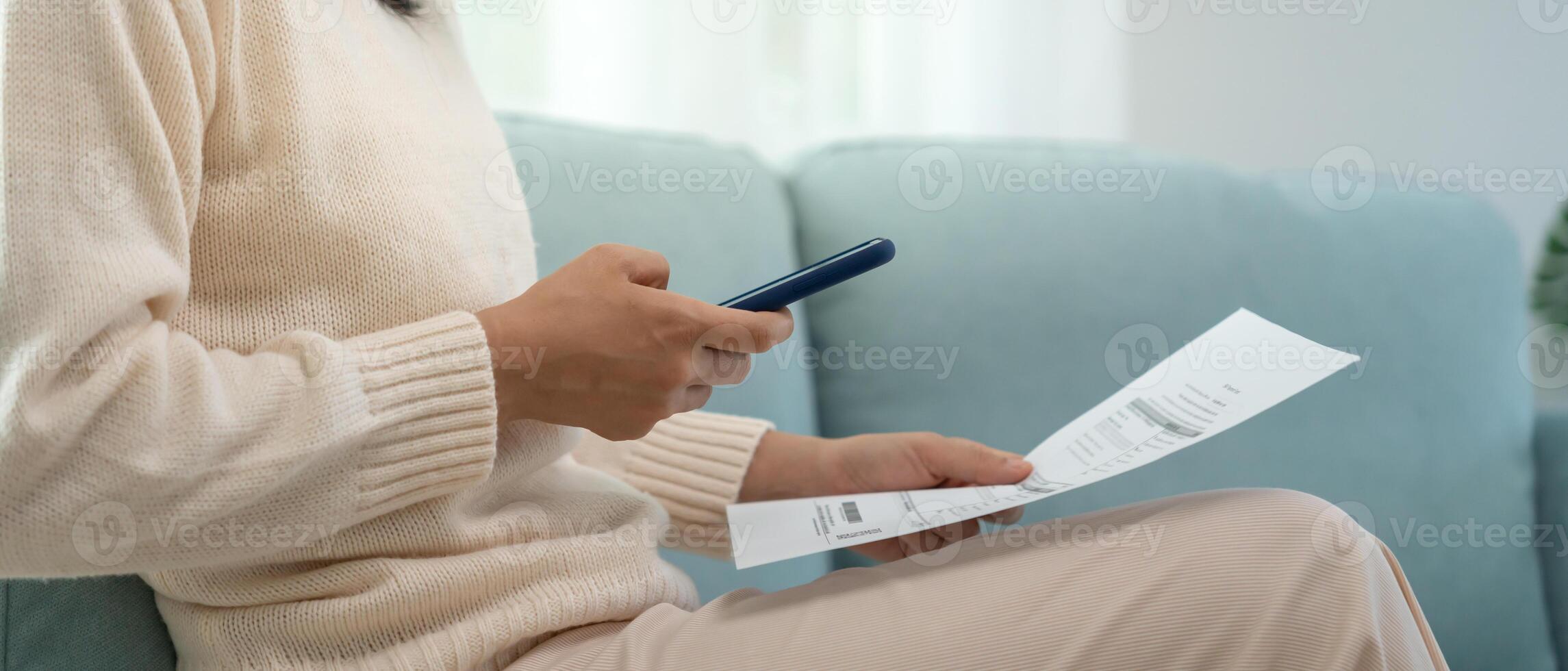 phone scan barcode or QR codes to pay credit card bill after receiving document invoice. payment, receive, paying electricity, digital payments, technology, scanning, financial transactions photo