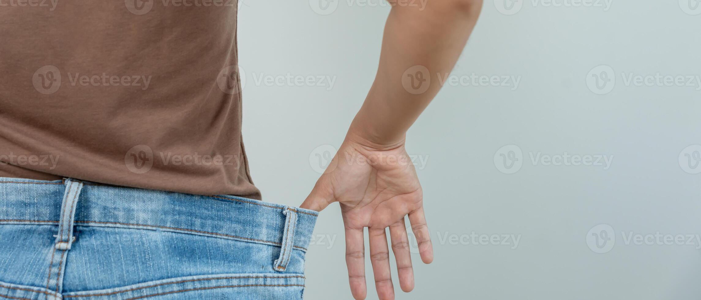 results of diet. Beautiful shape. female have a reduced waist size after under going a weight loss corse. can not wear jeans due to weight loss. balance, control, routines, exercise photo
