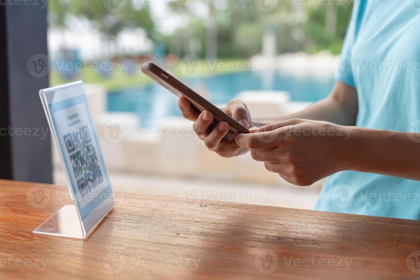 use smartphone to scan QR code to pay in cafe restaurant with a digital payment without cash. Choose menu and order accumulate discount. E wallet, technology, pay online photo