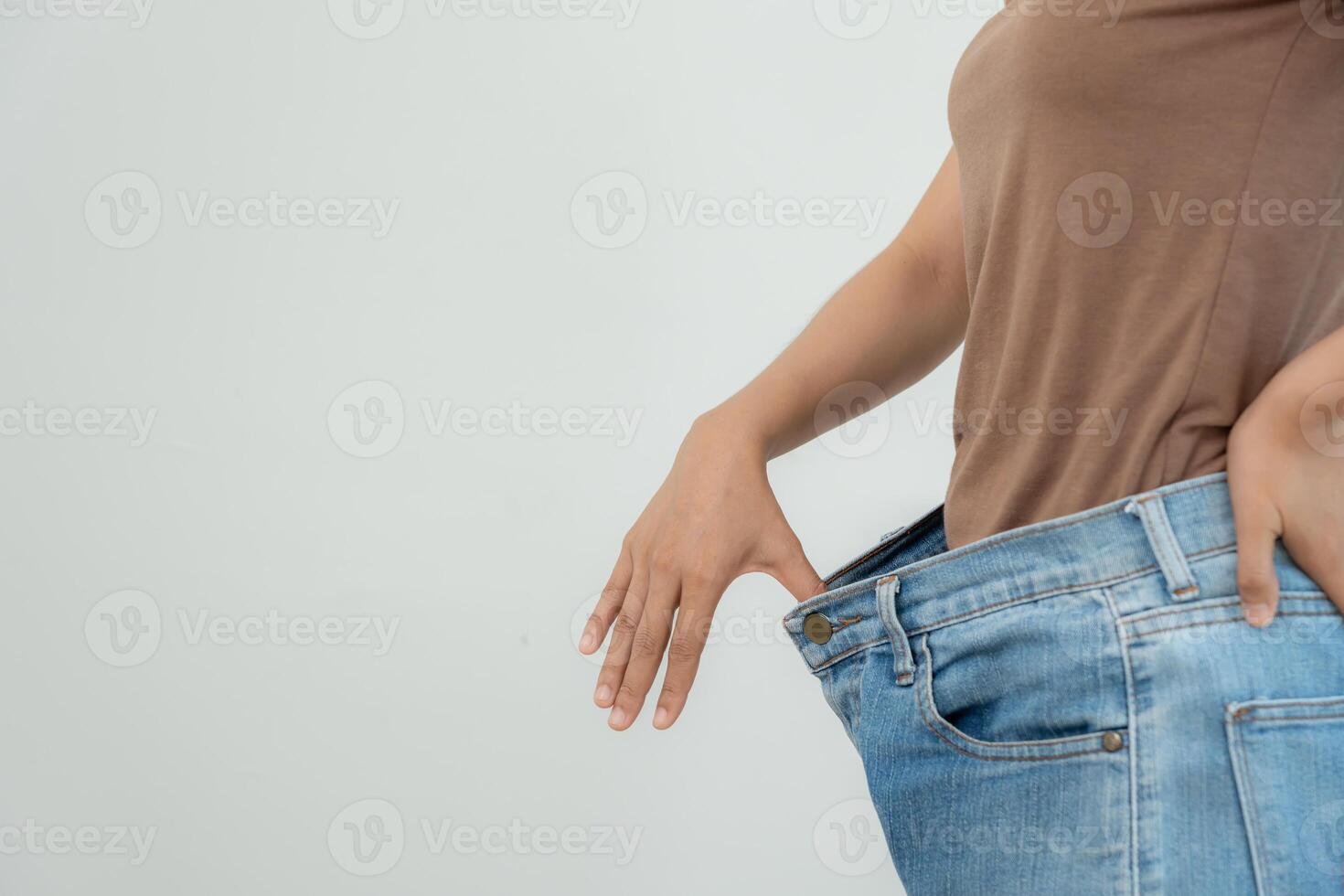 Beautiful shape. female have a reduced waist size after under going a weight loss corse. can not wear jeans due to weight loss. balance, control, routines, exercise photo