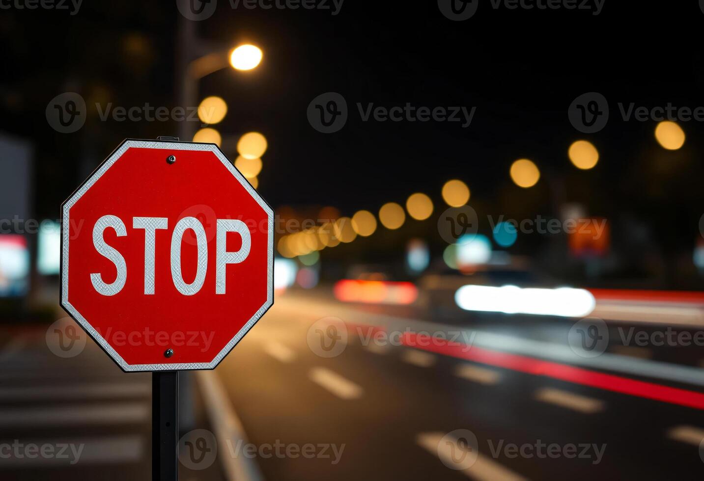 A Stop sign in a night, with city lights and cars on the road, blurred bokeh effect, lighting and long exposure time photo