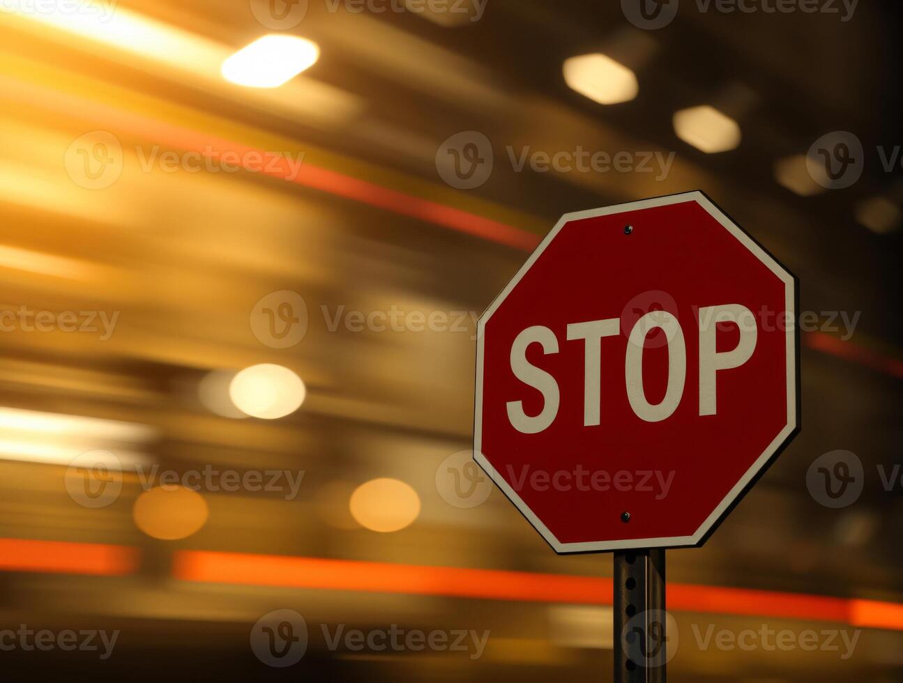 A Stop sign isolated on blurred bokeh effect with contrasting chiaroscuro lighting and long exposure time photo
